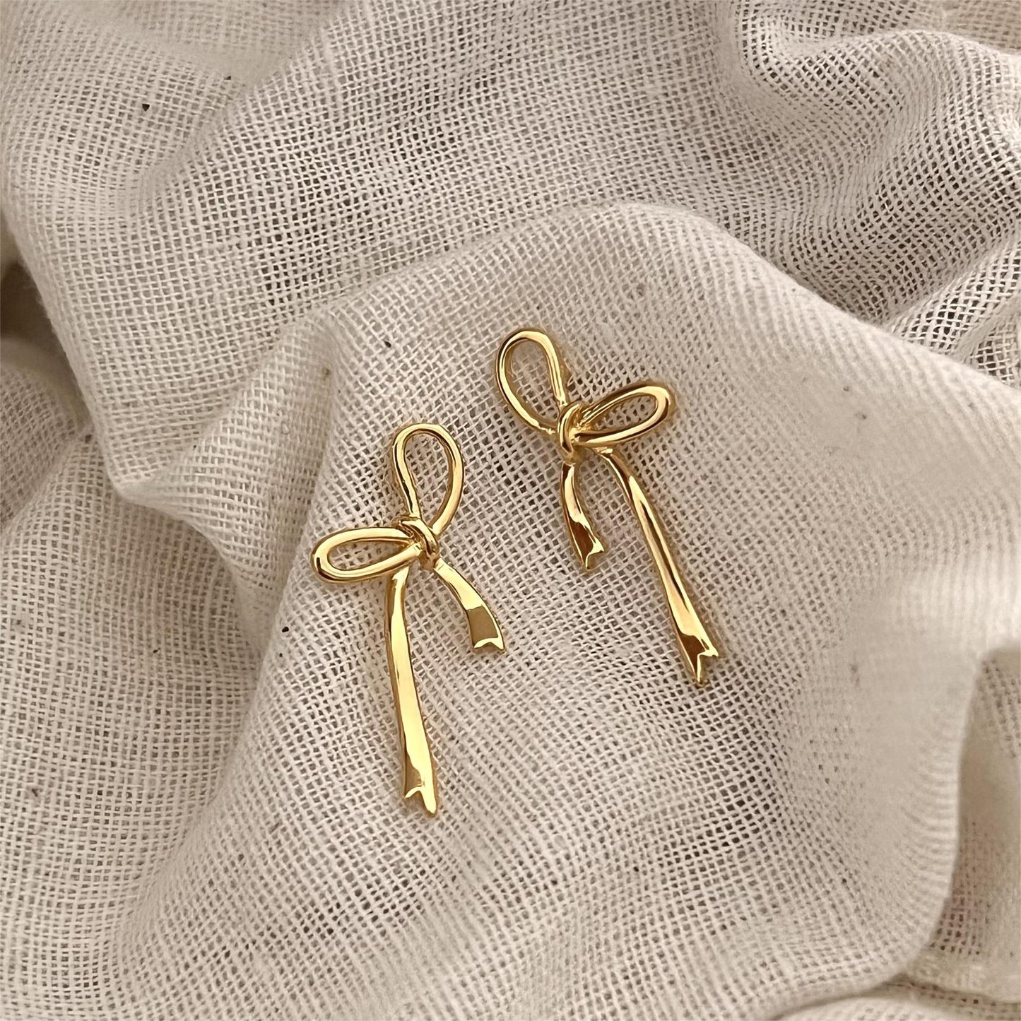 Chrome Bow Knot Ear Studs