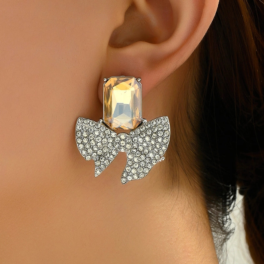 Stone and Rhinestones Bow ear studs