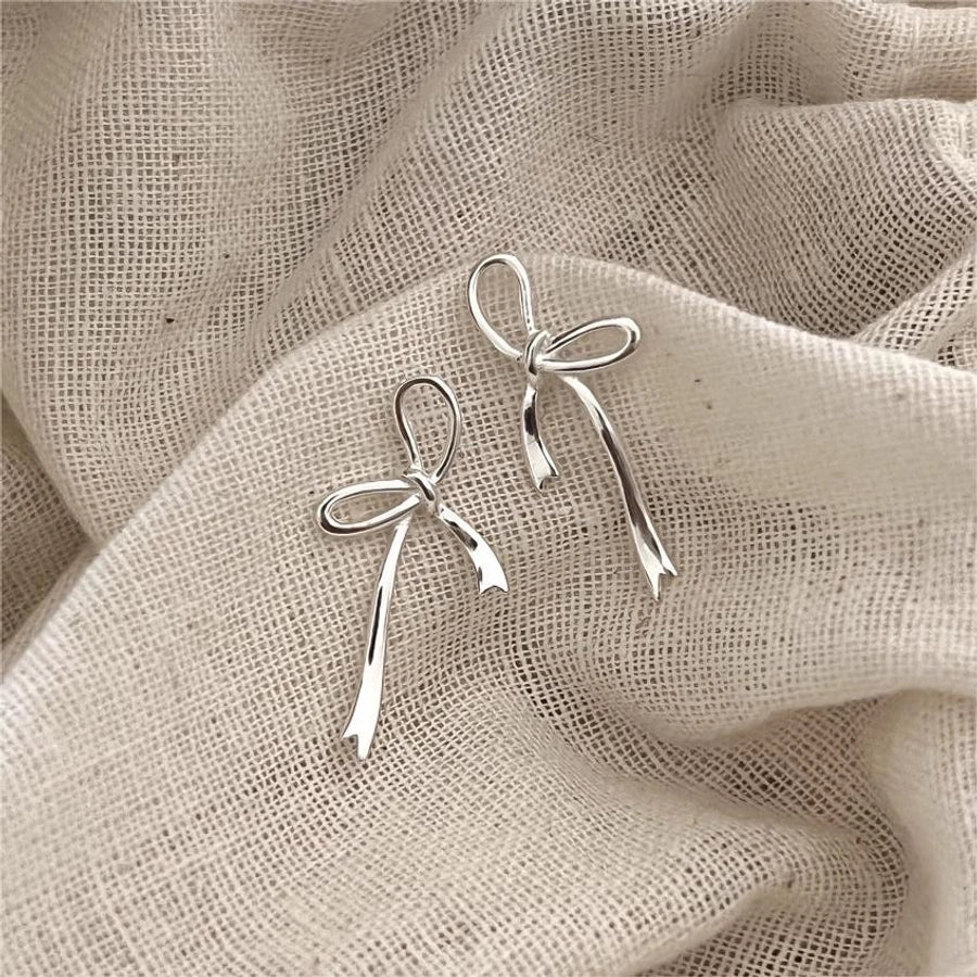 Chrome Bow Knot Ear Studs