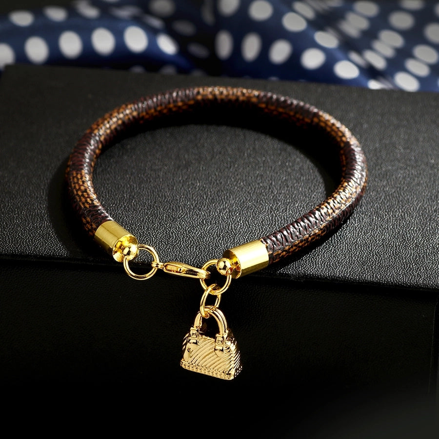 Chic leather bracelet with Bag charm