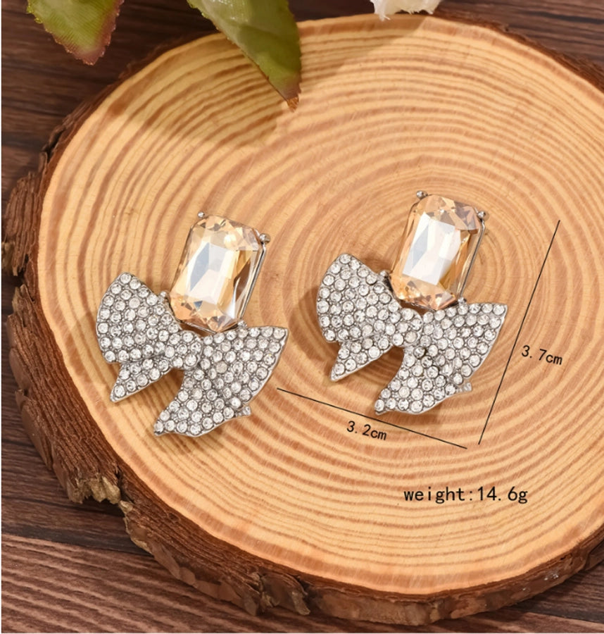 Stone and Rhinestones Bow ear studs